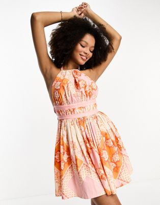 ASOS DESIGN halter mini sundress with strappy back in pink scarf print