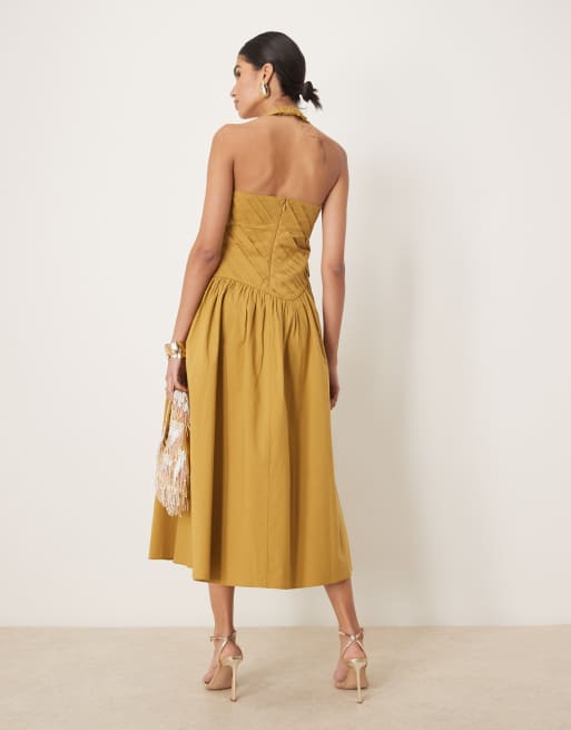 ASOS DESIGN halter neck asymmetric pleat bodice midi dress with dropped waist in turmeric