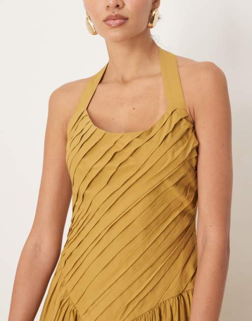 ASOS DESIGN halter neck asymmetric pleat bodice midi dress with dropped waist in turmeric