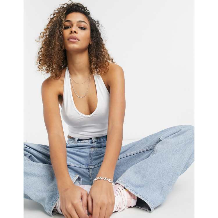 ASOS DESIGN halter cross neck crop top with button detail in light