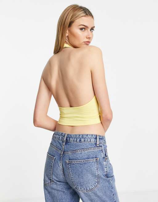 ASOS DESIGN cross over halter ribbed crop top in white