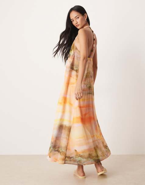 ASOS DESIGN halter neck maxi dress with bead detailing in washed sunset print