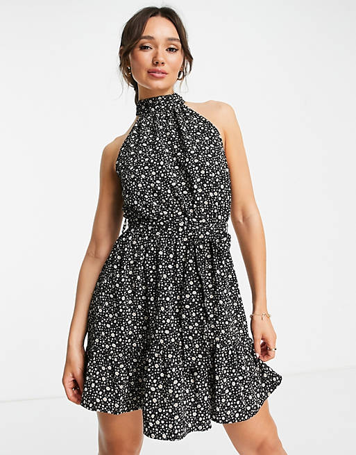 Dresses halter neck mini dress with a belt in floral print 
