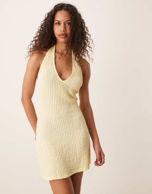 ASOS DESIGN halter neck mini textured dress in lemon