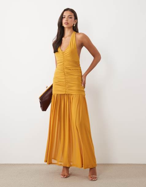 ASOS DESIGN halter neck ruched maxi dress with sheer skirt in mustard - view 1