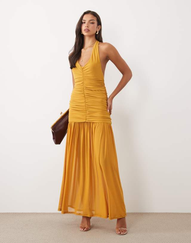 ASOS DESIGN halter neck ruched maxi dress with sheer skirt in mustard
