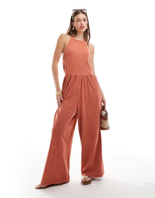 ASOS DESIGN halter neck trapeze jumpsuit in orange | ASOS