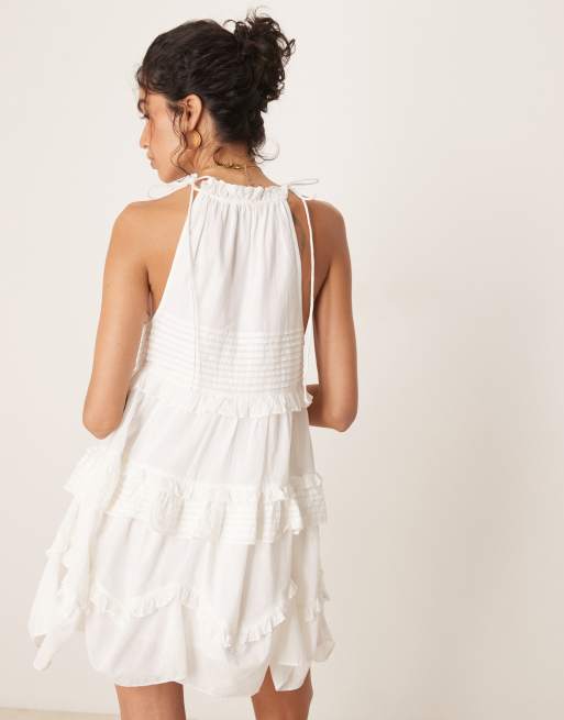 ASOS DESIGN halter ruffle mini dress with pintucks in white