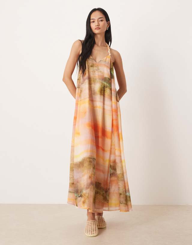 ASOS DESIGN halterneck maxi dress with bead detail in washed sunset print