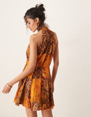 Shop Asos Design Halterneck Mixed Print Mini Dress In Multi