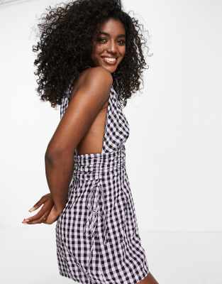 ASOS DESIGN halterneck playsuit with gathered waist and open back in gingham