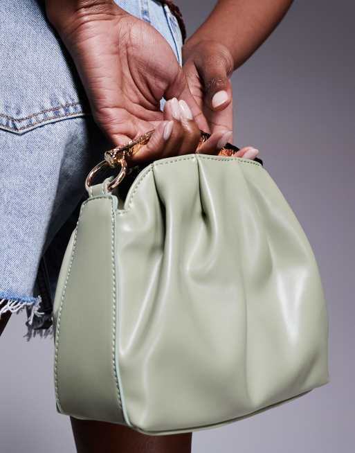 ASOS DESIGN hammered metal top handle grab bag in green with detachable cross body strap, 2 of 4