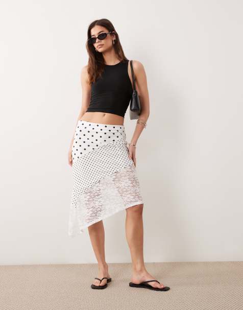 ASOS DESIGN handkerchief hem skirt in polka dot print - view 1