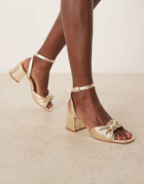 ASOS DESIGN - Hansel - Geknoopte sandalen met halfhoge hak en brede pasvorm in goud - view 1