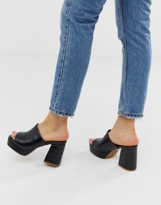 black platform mules