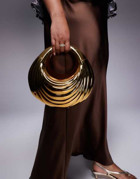 ASOS DESIGN - Hård clutch-taske i metallisk guldfarve med rillet design - view 1