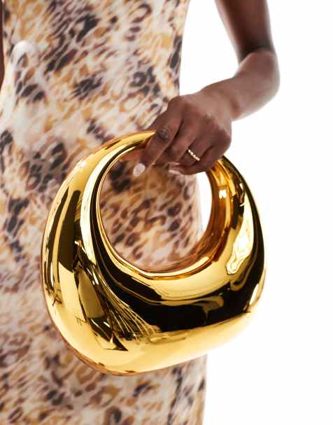 ASOS DESIGN hardcase scoop clutch in gold - view 1