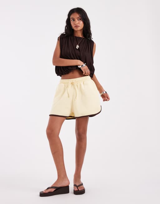 ASOS DESIGN - Hardloopshort in geel met bruin detail, 5 van 5