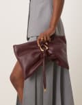 [ASOS DESIGN] ASOS DESIGN hardware detail wrap flap clutch bag in burgundy-Red No Size BURGUNDY