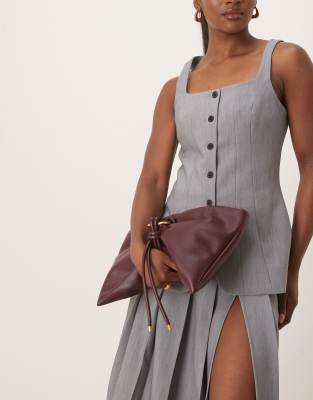 ASOS DESIGN hardware detail wrap flap clutch bag in burgundy