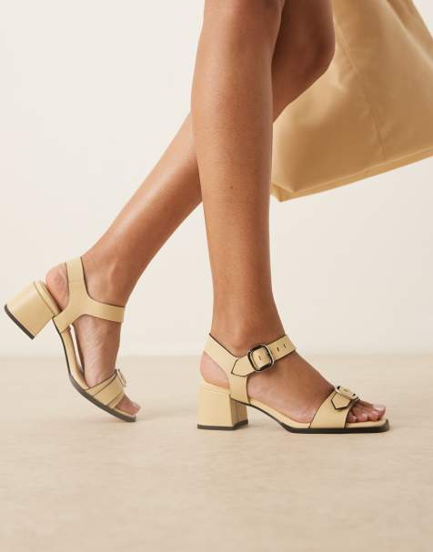 ASOS DESIGN - Harland - Premium leren schoenen met gesp detail en middelhoge hak in boterkleur - view 1