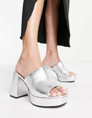 ASOS DESIGN Harmonize mid heeled platform mules in silver