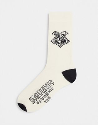ASOS DESIGN Harry Potter sports socks with Hogwarts badge in off white