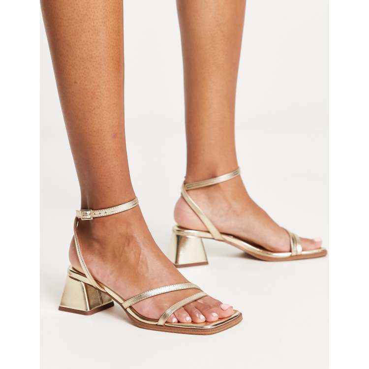 ASOS DESIGN Hastings mid block heeled sandals in gold