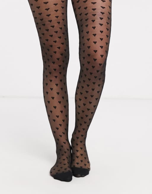 ASOS DESIGN heart tights with red heel heart in black