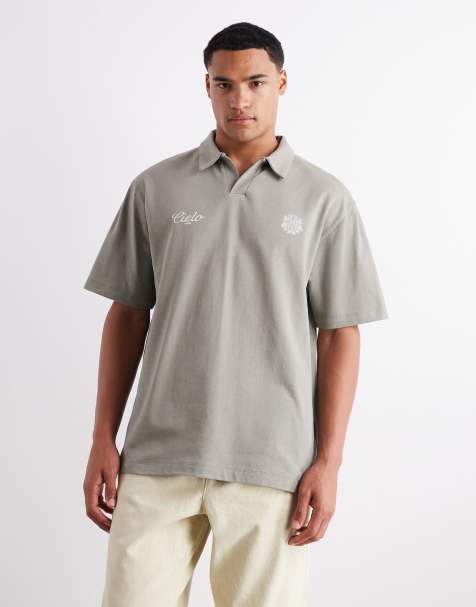 ASOS DESIGN heavyweight 240gsm relaxed fit polo shirt with chest print in khaki - view 1