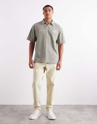 Asos Design Heavyweight 240gsm Relaxed Fit Polo With Chest Print In Green