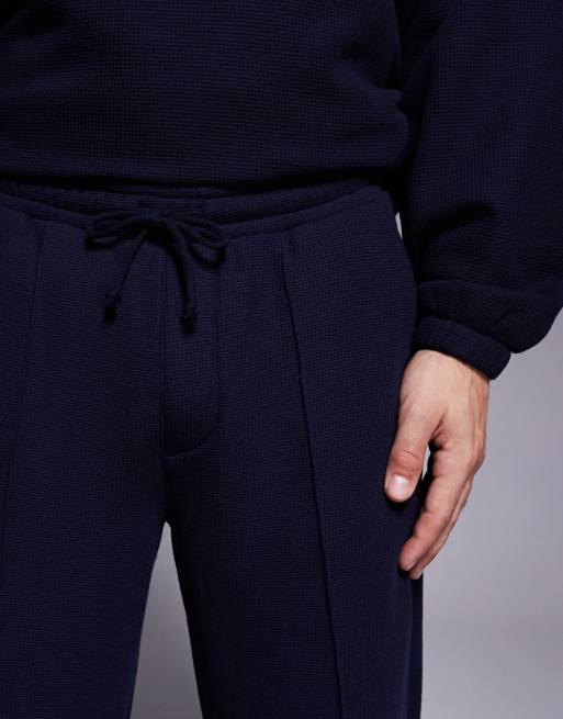 ASOS DESIGN heavyweight baggy smart trackies with pintuck front in navy ...