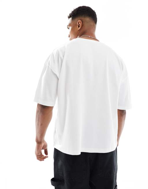  ASOS DESIGN heavyweight boxy dropped shoulder oversized t-shirt with city print in white