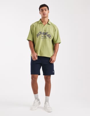 Asos Design Heavyweight Boxy Oversized Polo Shirt With Text Graphic In Green