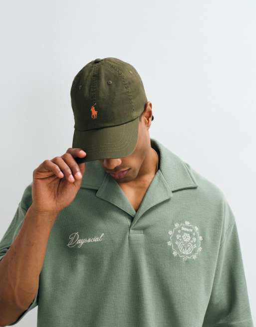 ASOS DESIGN heavyweight boxy oversized polo with chest graphics in green waffle, 3 of 5