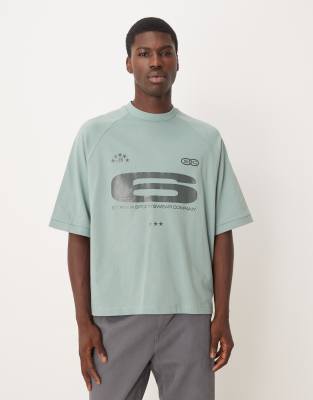 Asos Design Heavyweight Boxy Oversized Raglan T-shirt With Glossy Sports Graphic In Green