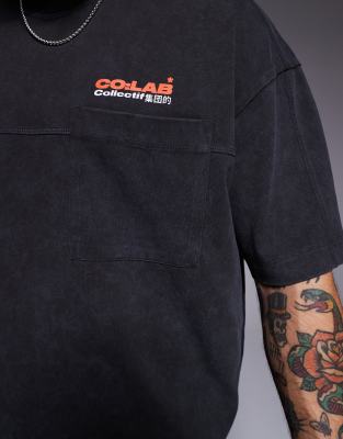 ASOS DESIGN boxy oversized T-shirt in heavyweight 220gsm washed charcoal with text graphic and pocket detail
