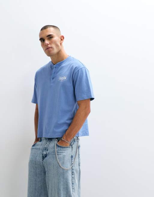 ASOS DESIGN heavyweight boxy relaxed polo with chest text graphic in blue wash, 3 of 5