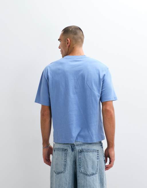 ASOS DESIGN heavyweight boxy relaxed polo with chest text graphic in blue wash, 5 of 5