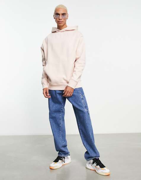 Pharrell Williams Pops in Pink Hoodie & Chunky Sneakers for