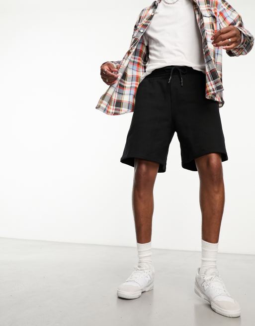 ASOS DESIGN heavyweight oversized jersey shorts in black | ASOS