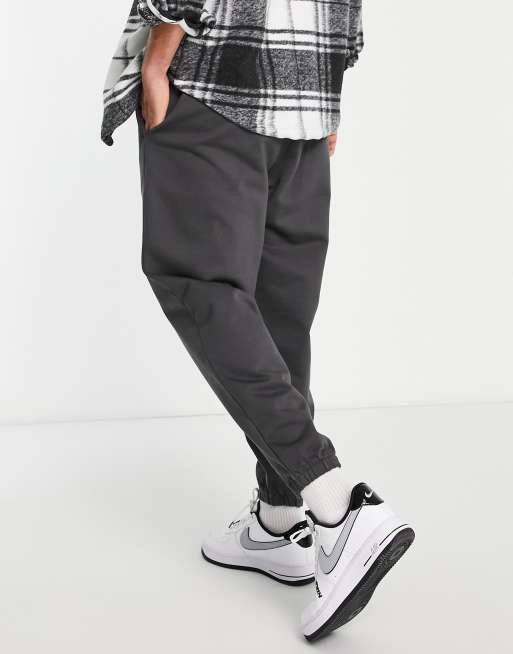 ASOS DESIGN oversized sweatpants in washed black