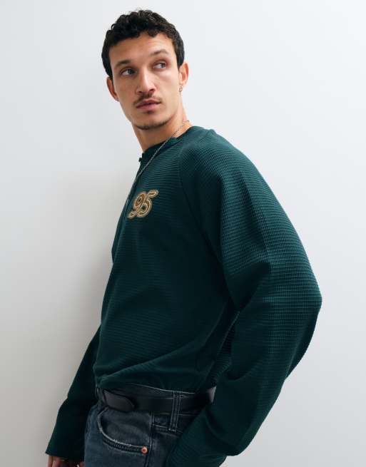 ASOS DESIGN heavyweight oversized long sleeve henley with 95 embroidery in dark green, 4 of 5