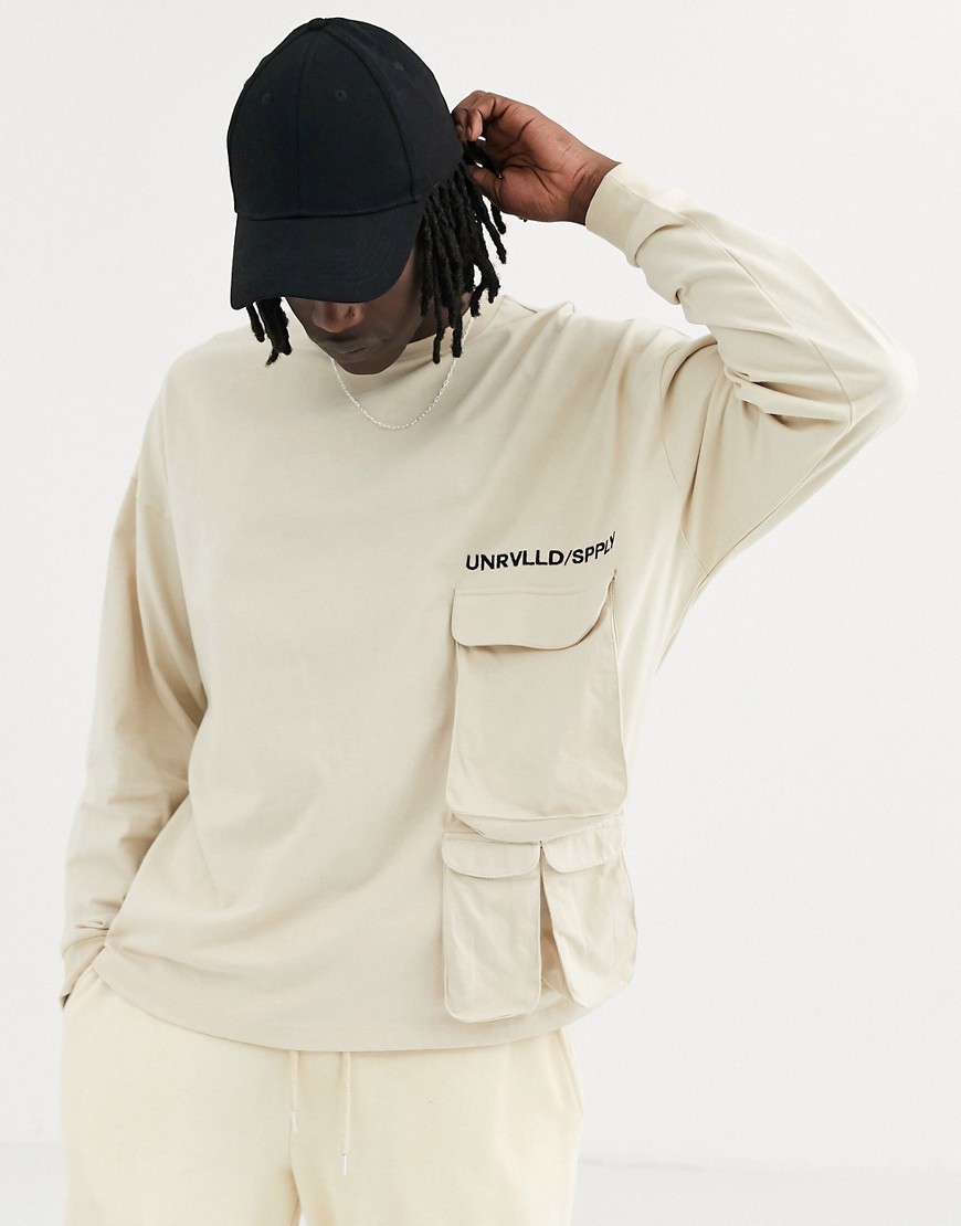 ASOS DESIGN heavyweight oversized long sleeve t-shirt with utility pocket embroidery and Unrivalled Supply Logo-Beige