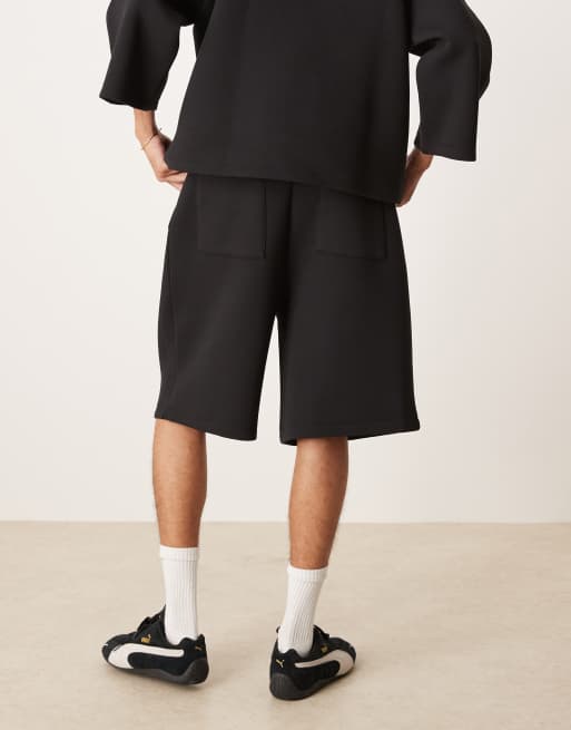 ASOS DESIGN heavyweight oversized longer length shorts in scuba-style fabric in black, 4 of 5