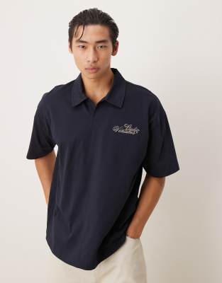 ASOS DESIGN heavyweight oversized polo shirt with chest embroidery in navy - view 1