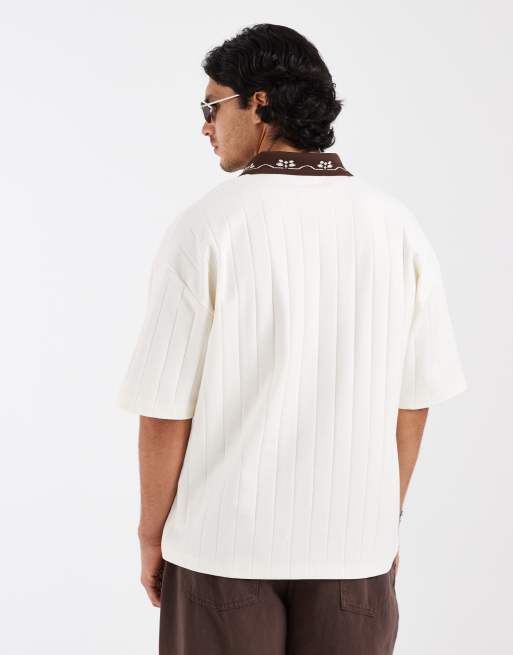 ASOS DESIGN heavyweight oversized polo with football graphic in neutral wide rib, 4 of 5