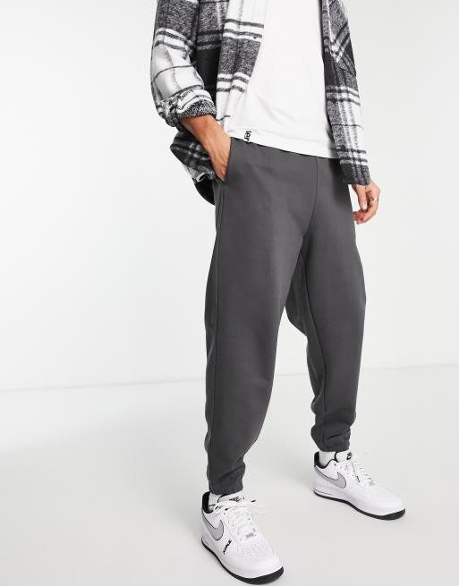 ASOS DESIGN oversized sweatpants in washed black