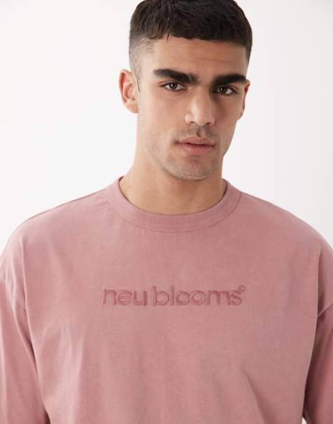 ASOS DESIGN heavyweight oversized t-shirt with text graphic in pink wash