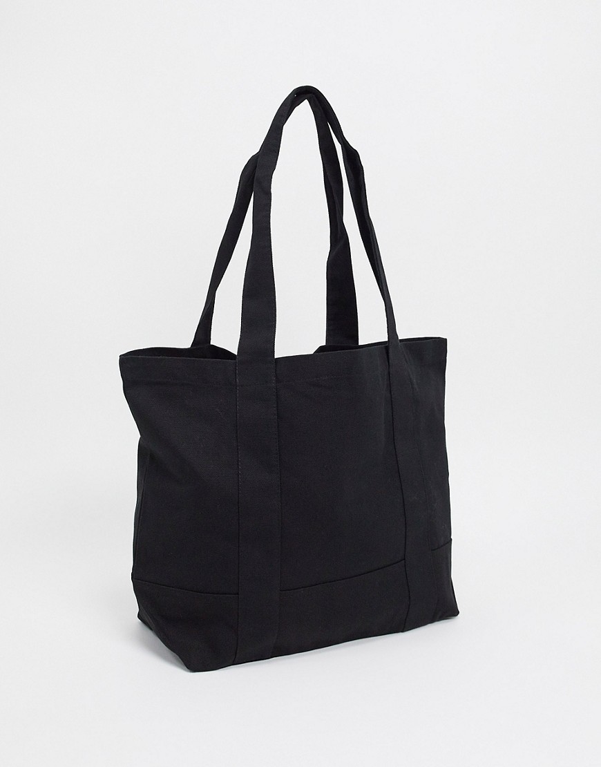 ASOS DESIGN heavyweight oversized tote bag in black canvas